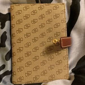 Dooney & Burke brown 20 page photo album.